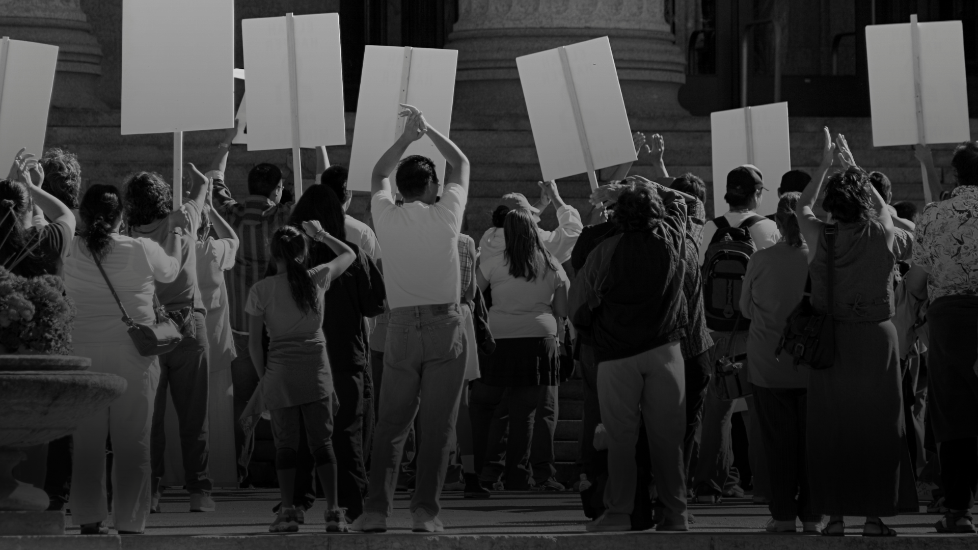 People demonstrating with signs