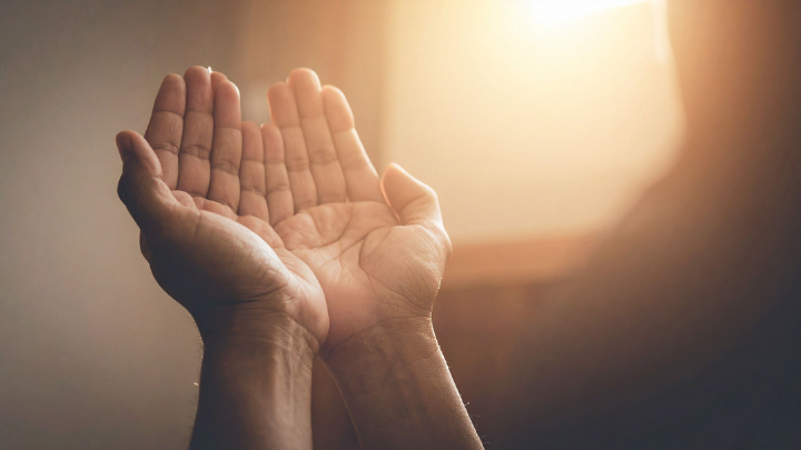 Hands Open in Prayer
